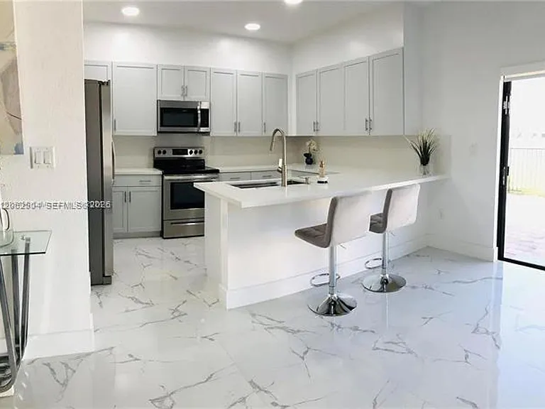 10162 SW 228th Ter #Townhouse 10162 — Photo 1