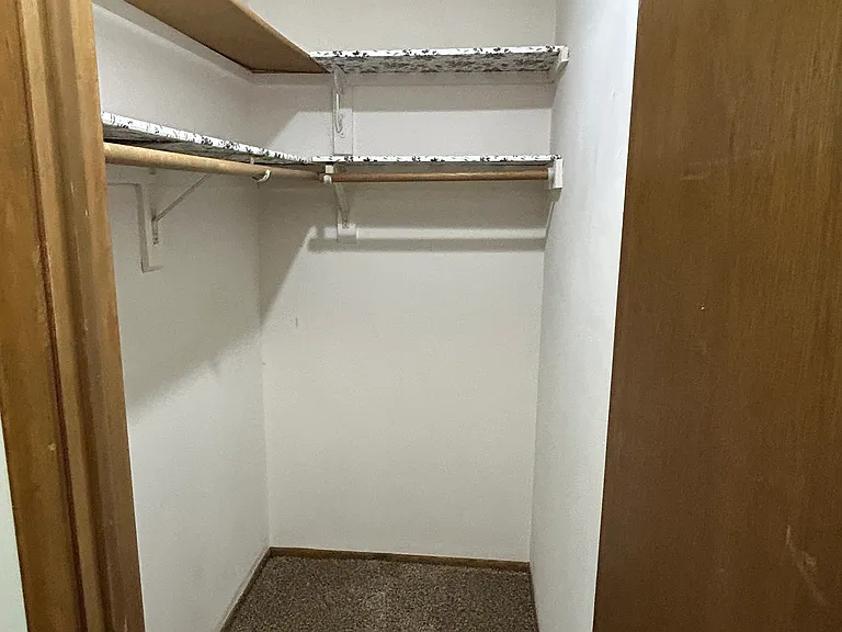 Walk in closet in largest bedroom