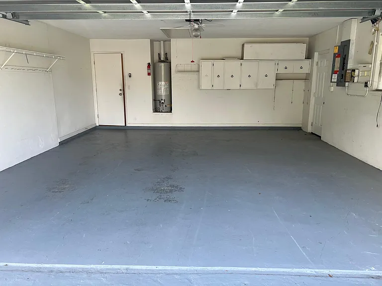 2 car garage with some storage space