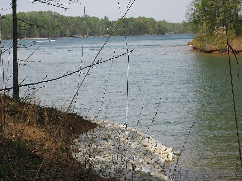 Rip rap in place along water
