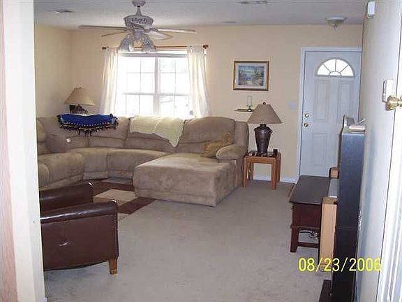 ceiling fans and plenty of lighting throughout!