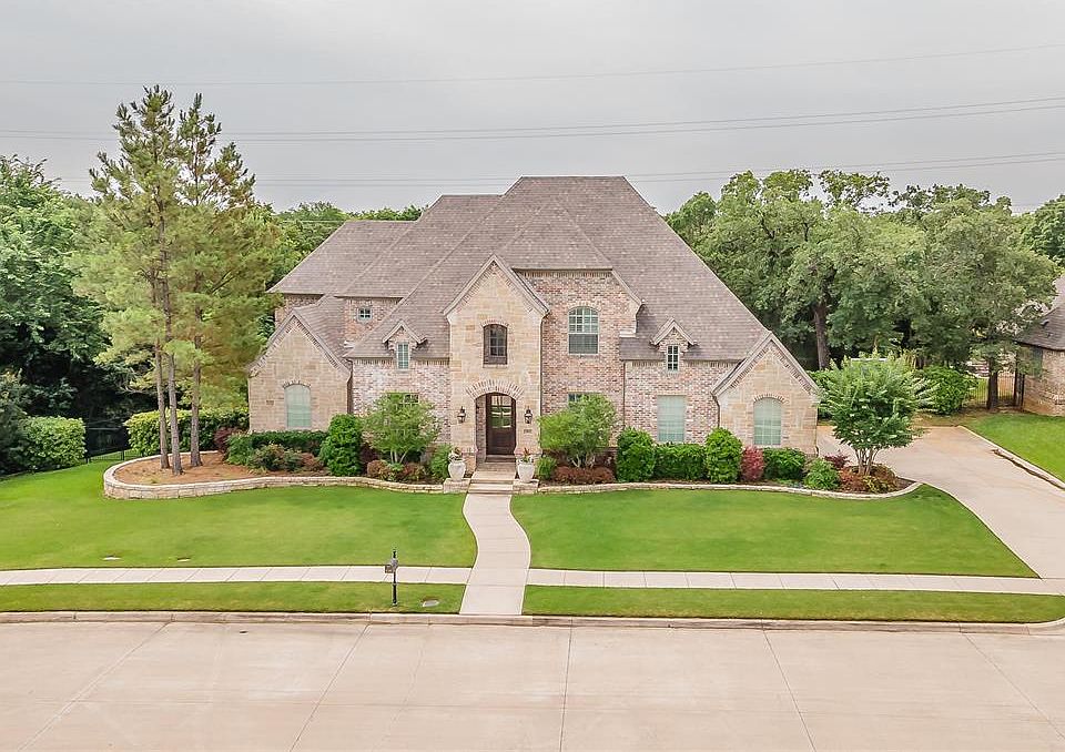 Gorgeous estate in CARROLL ISD nestled on a large lot surrounded by preserve space for extra privacy.