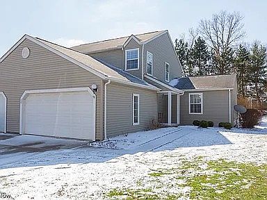 Street View w/ Garage and 2 Driveway Spots
