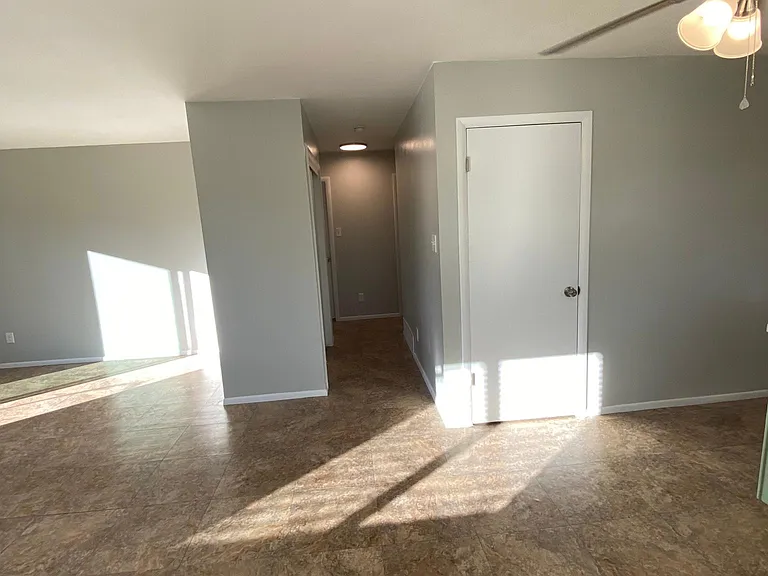 Hallway to bedrooms and bathroom