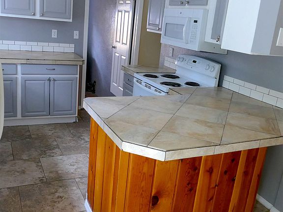 Kitchen facing the laundry room.