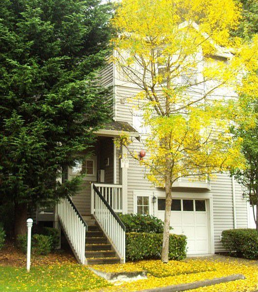 Front photo - this townhome is a coveted end unit