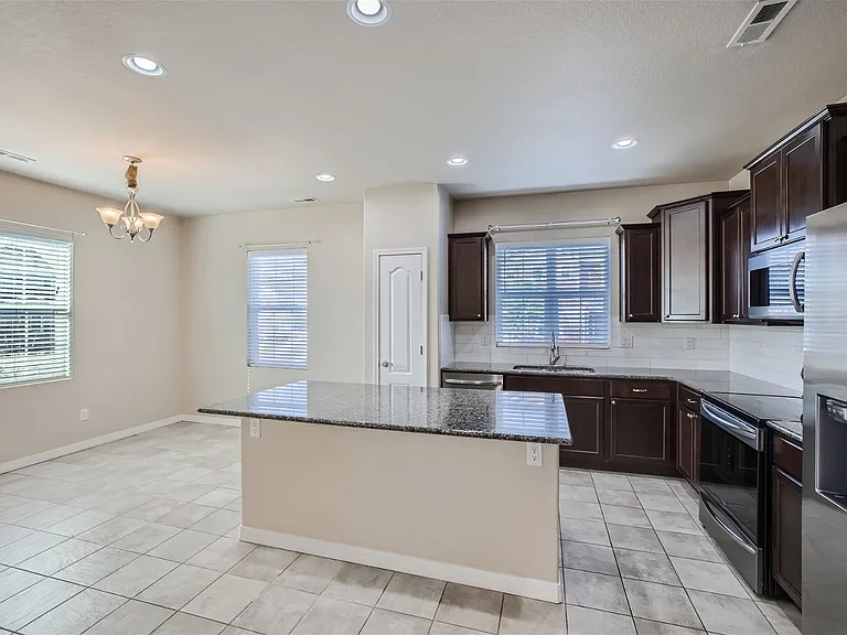 8807 Bella Flora Hts — Photo 7