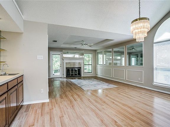Bright open formal dining and living room.