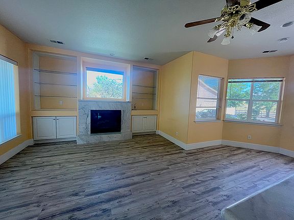 next to Kitchen living room area with fireplace