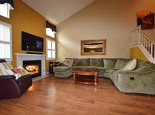 Hardwood floors and gas fireplace.
