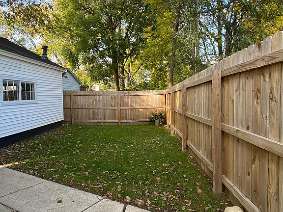 Cute, private yard with area large enough for patio furniture.