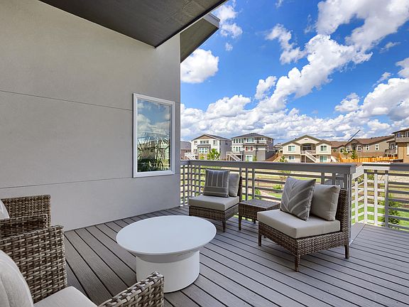 Spacious Deck Photo representing home to be built and may demonstrate optional features