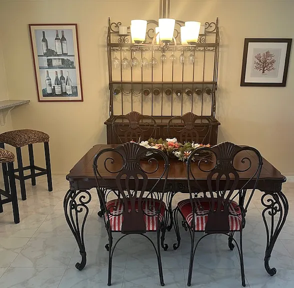 Dining area. Additional leaf and extra chairs available in master bedroom closet.