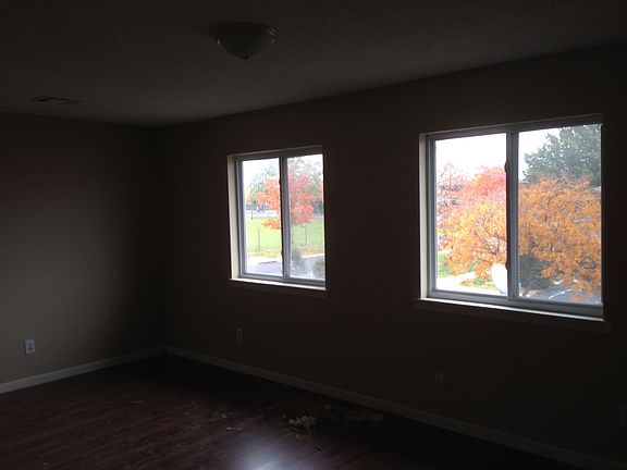 Large windows are found throughout this apartment home