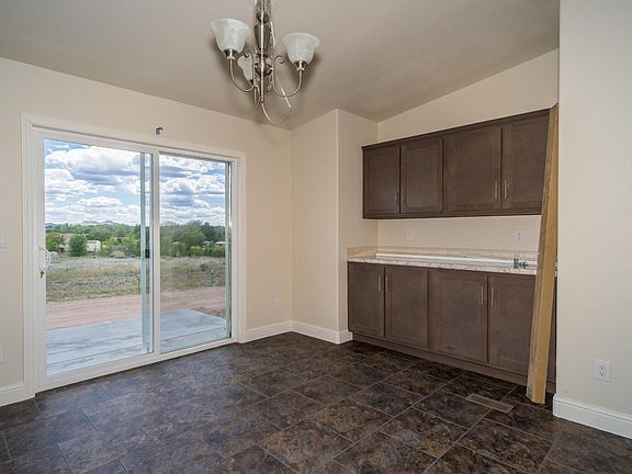 Dining Area - Very open & bright.  Upgraded trim thru-out, chandelier light.