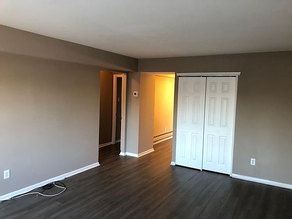 Family Room - closet and hall to bedrooms/bathroom and dining/kitchen
