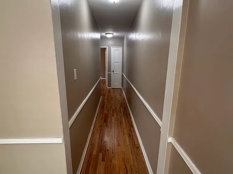 Hallway with linen closet