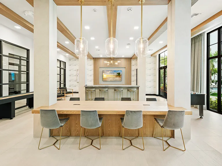 The resident clubroom provides stylish spaces for gathering, socializing, and unwinding.