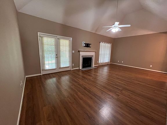 Living room with hardwoods and fireplace