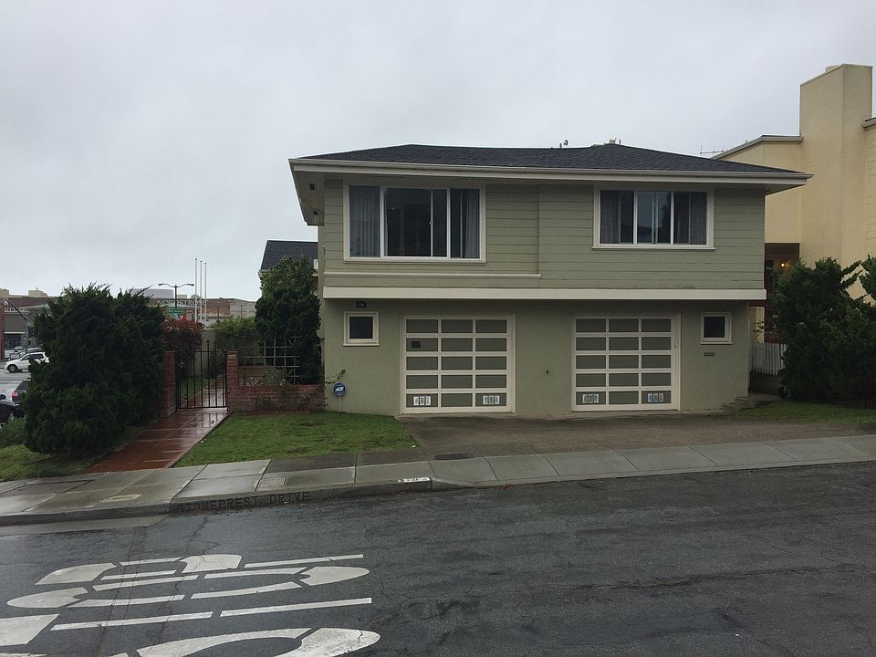 House from outside, garage, front door at side