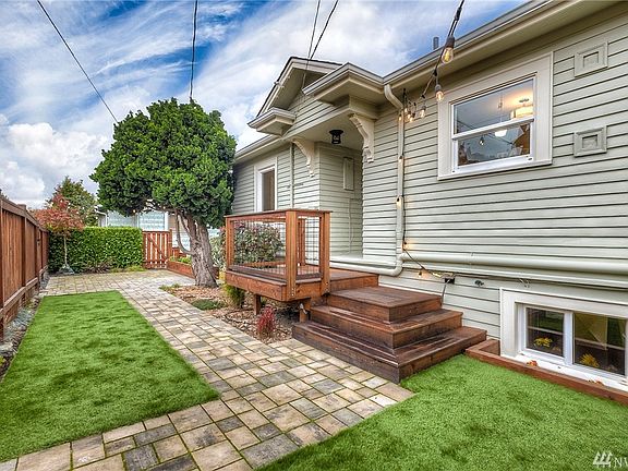 Private back deck (2018)& paver patio, sustainable hardwood deck, synthetic turf- low maintenance & perfect quiet spot for a book.