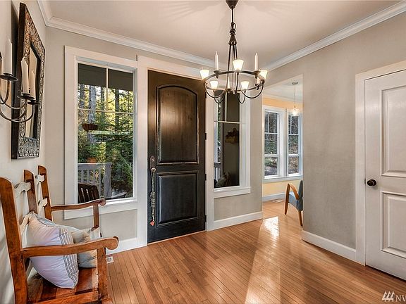 Enter onto Brazilian cherry hardwood floors, kick off your shoes and prepare for the view ahead.  