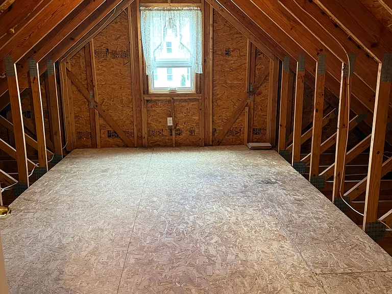 attic storage in eaves on second floor, easy full door access