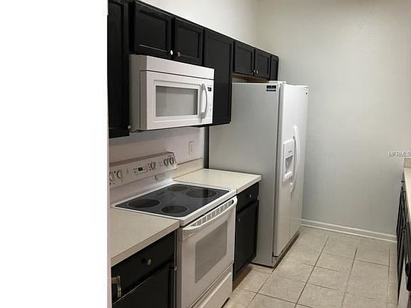 2nd image of 7123 Yacht Basin Ave APT 318