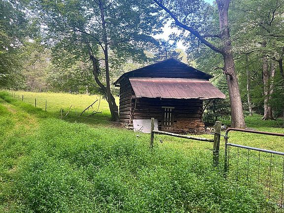 2 standing tobacco barns