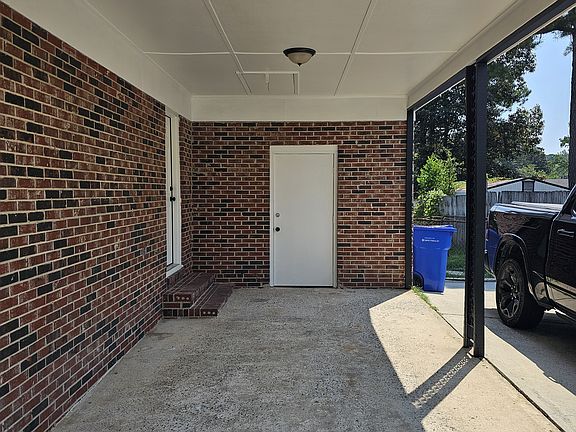 Car port. Lockable storage closet, and entrance into the home.