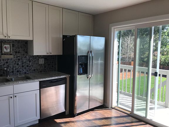 Deck opens to park like backyard 