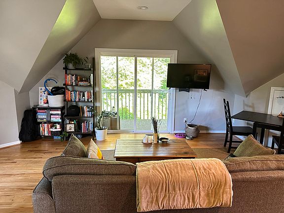 Open living area opens up to private deck.