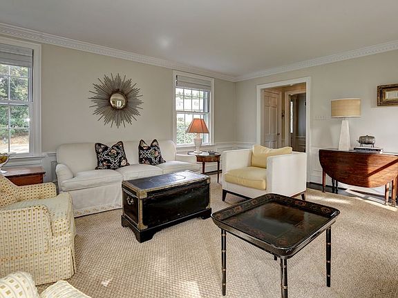 Living Room w/ Fireplace & Built-ins