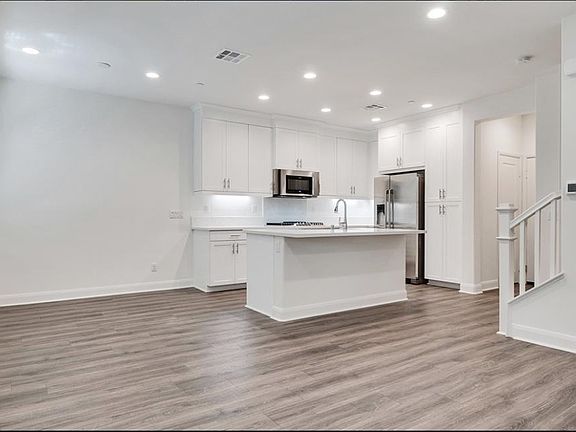FIRST FLOOR KITCHEN/DINING AREA. BRAND NEW APPLIANCES