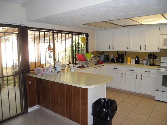  2ND VIEW OF KITCHEN FROM LIVING AREA