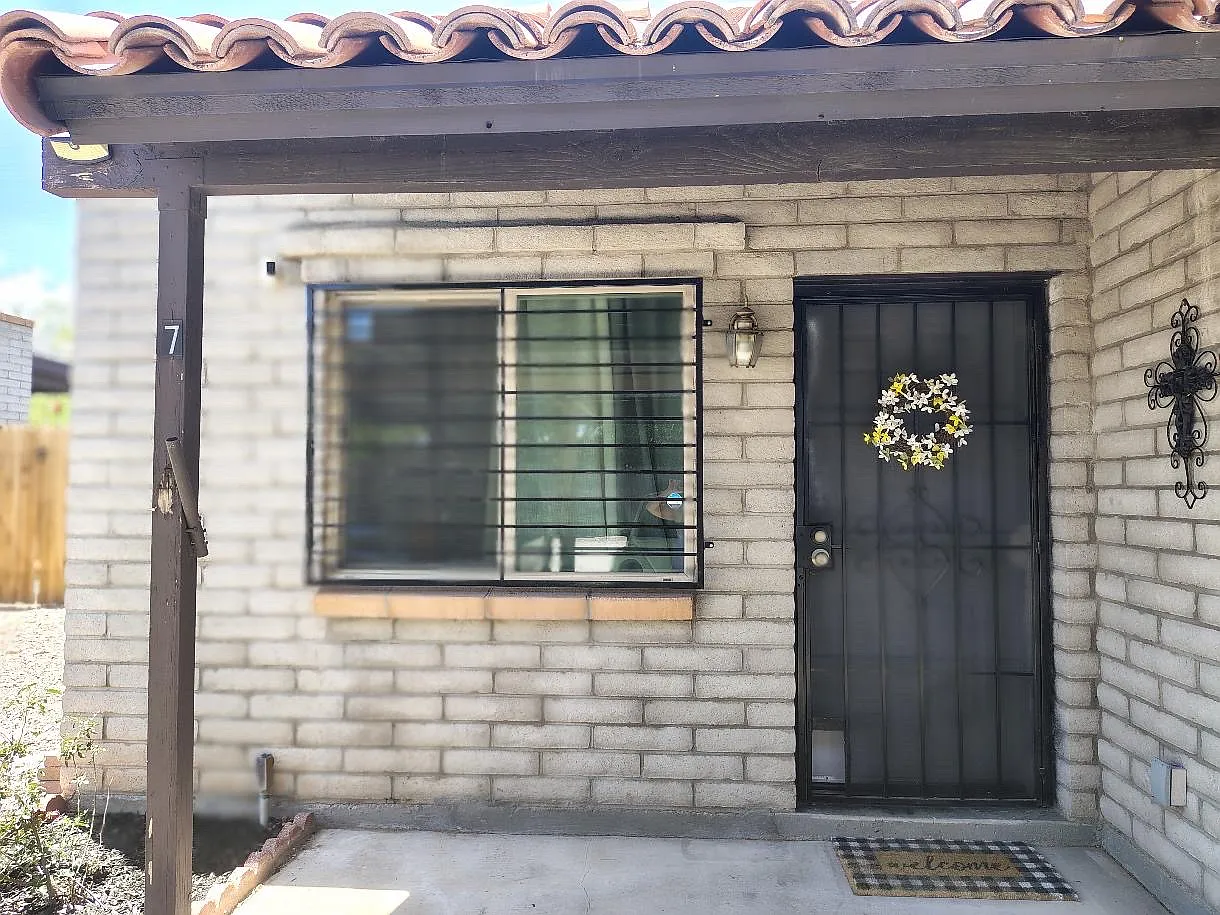 211 W Roger Rd — Photo 1