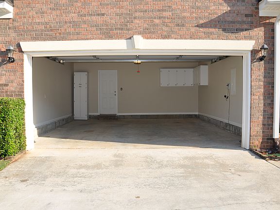 Garage with cabinets storage