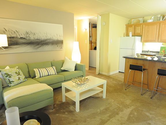 open concept living room with private balcony