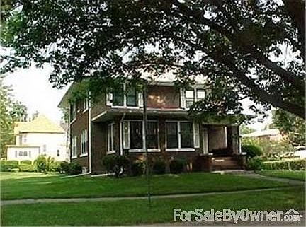 View of front of the house
						:
						Built on double lot with lots of shade from large trees
