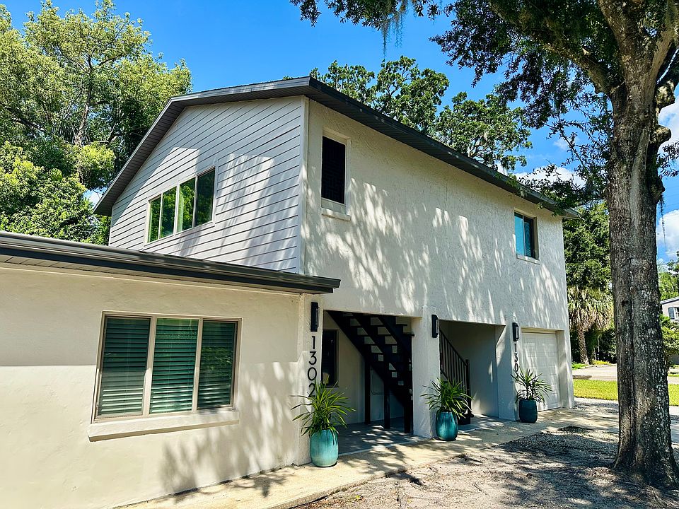 Exterior view of building and upstairs unit