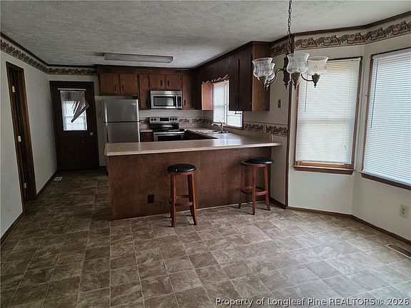 5th image of 843 Whispering Pines Rd