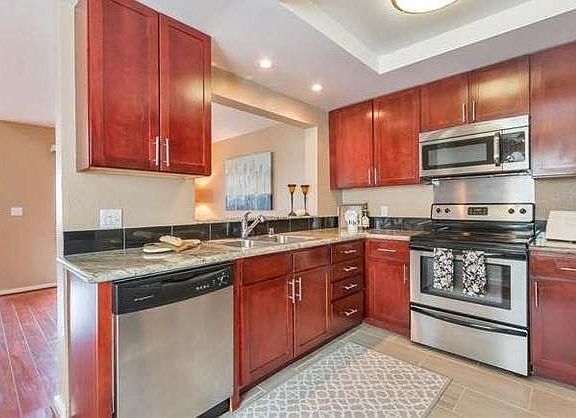 updated kitchen with granite countertop