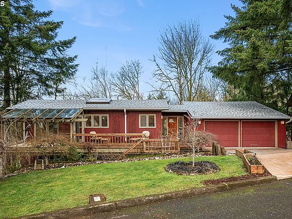 front of house from street (in the summer there are roses)