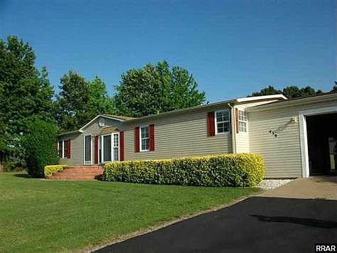 Floored and finished; 920 Sq. Ft. garage.  Driveway is double wide paving from road to Garage.