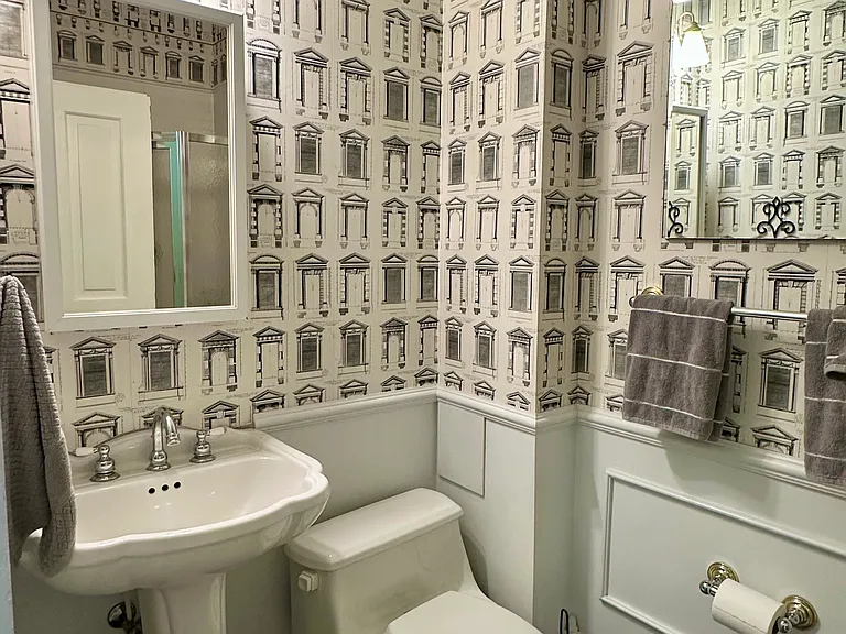 First of two baths with walk-in shower