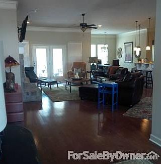 View from the front door
						:
						directly to your right are the 3 bedrooms and full bath