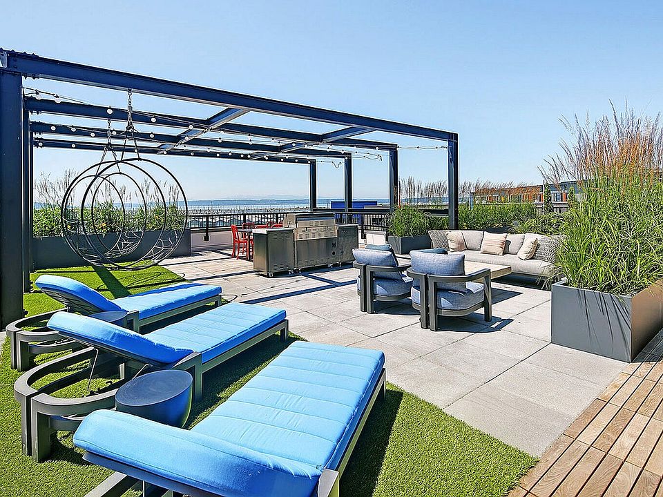 Experience the ultimate in outdoor comfort with this luxurious rooftop patio.