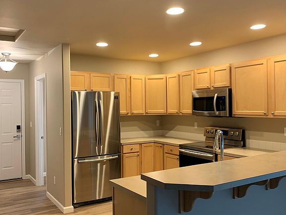 Large kitchen with full stainless steel appliance package