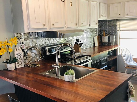 Butcher block counters today with barstools.