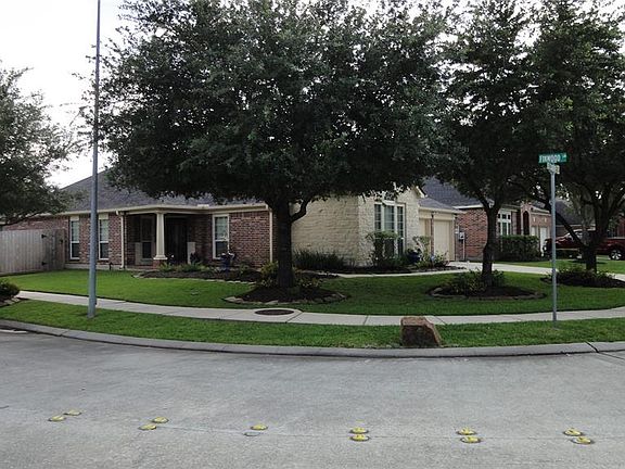 See yourself in this snapshot gazing upon the homes beautifully landscaped front.